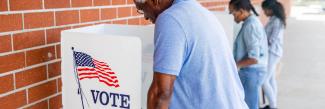 African American man voting.